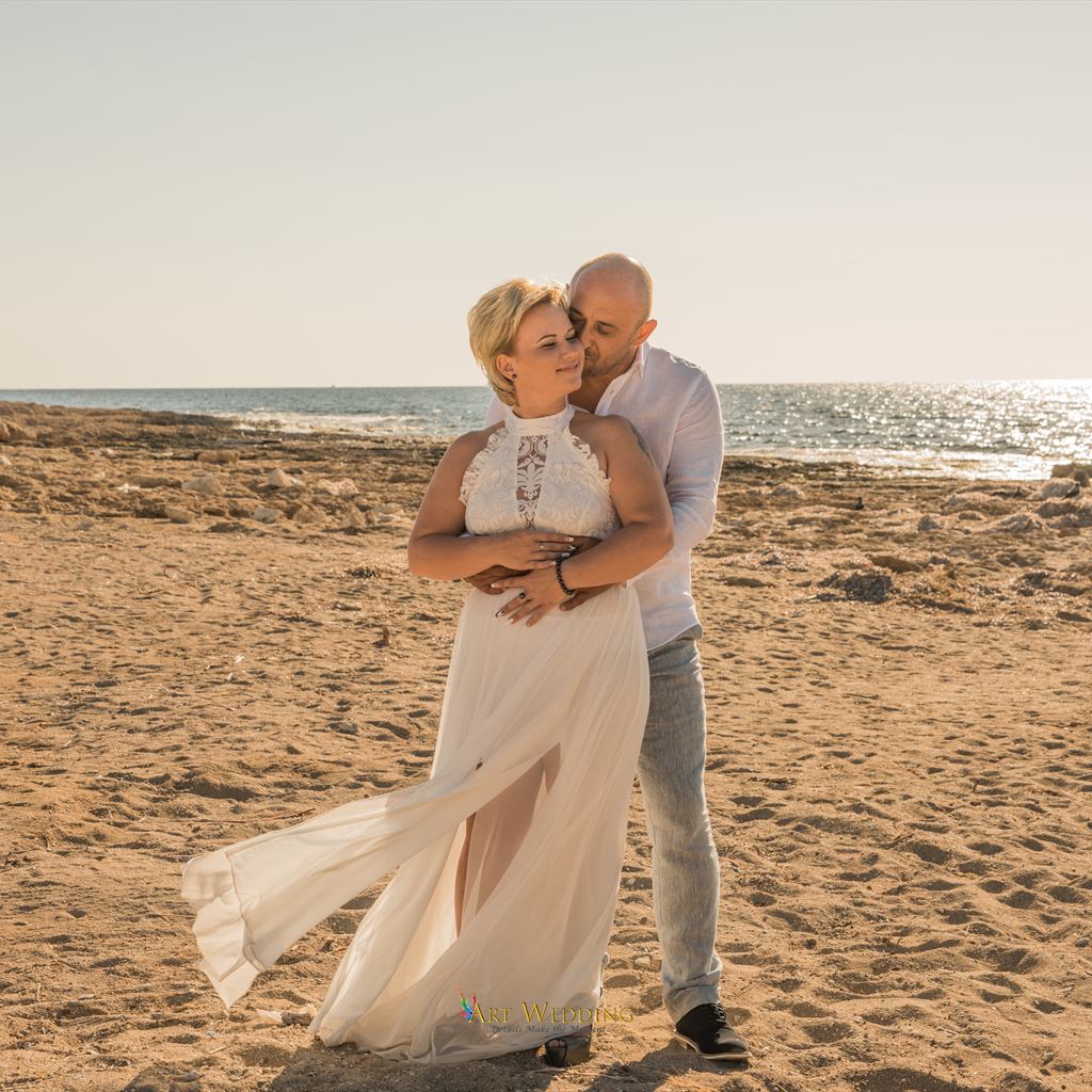 Tender portrait of newlyweds by the sea