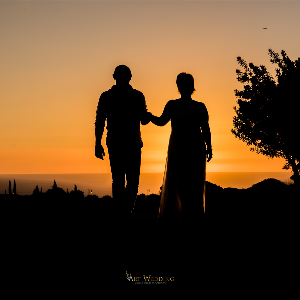Newlywed silhouettes during a sunset photo walk