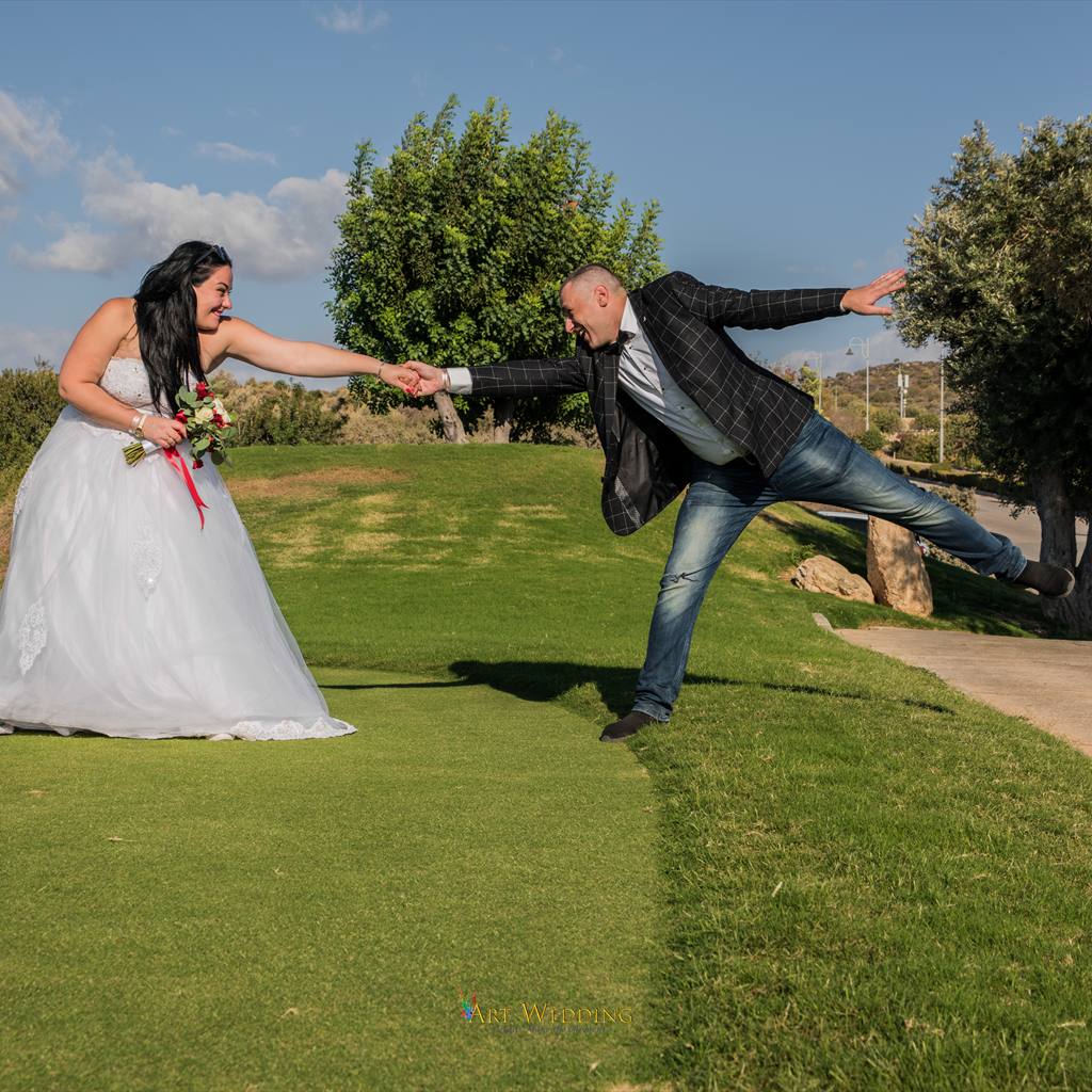 A playful moment during the newlyweds’ photo walk on the lawn