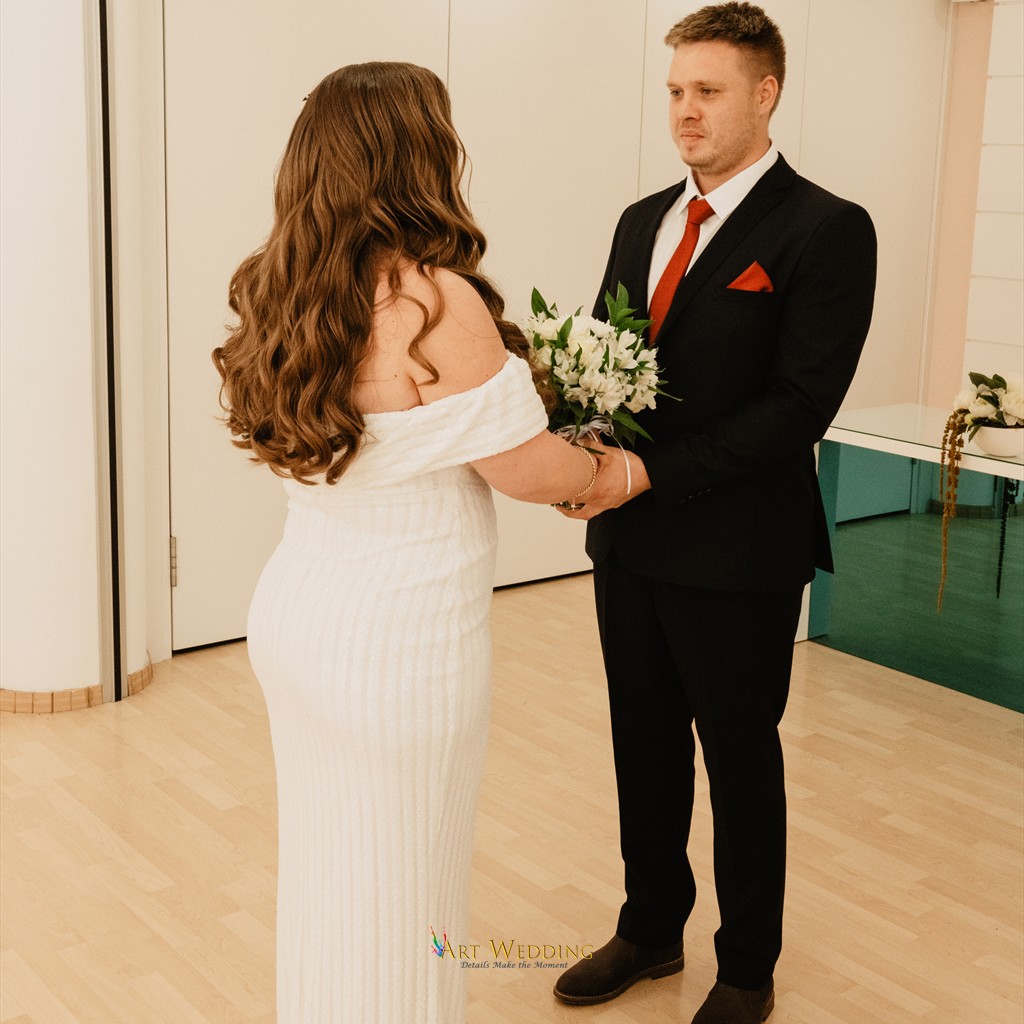 Couple holding hands during their Aradippou civil ceremony