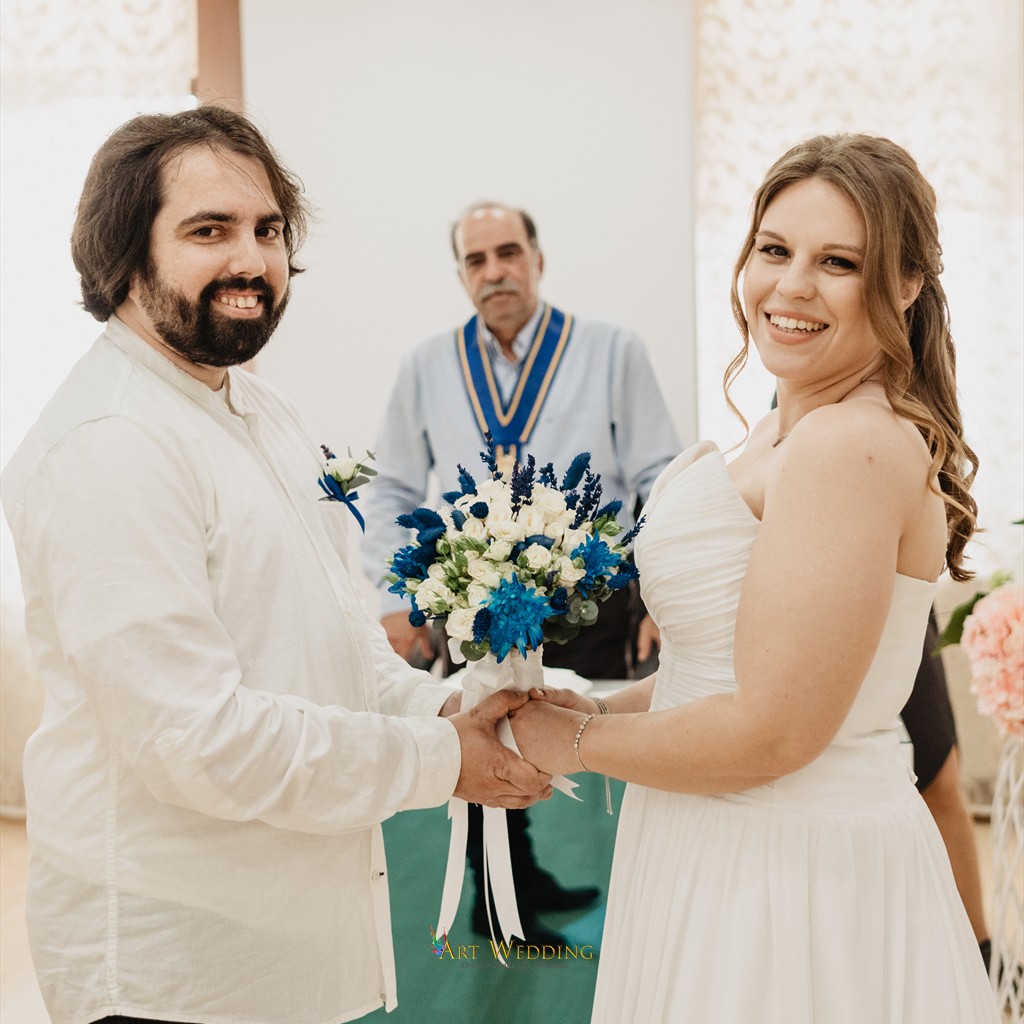 Couple with the registrar at their Aradippou wedding