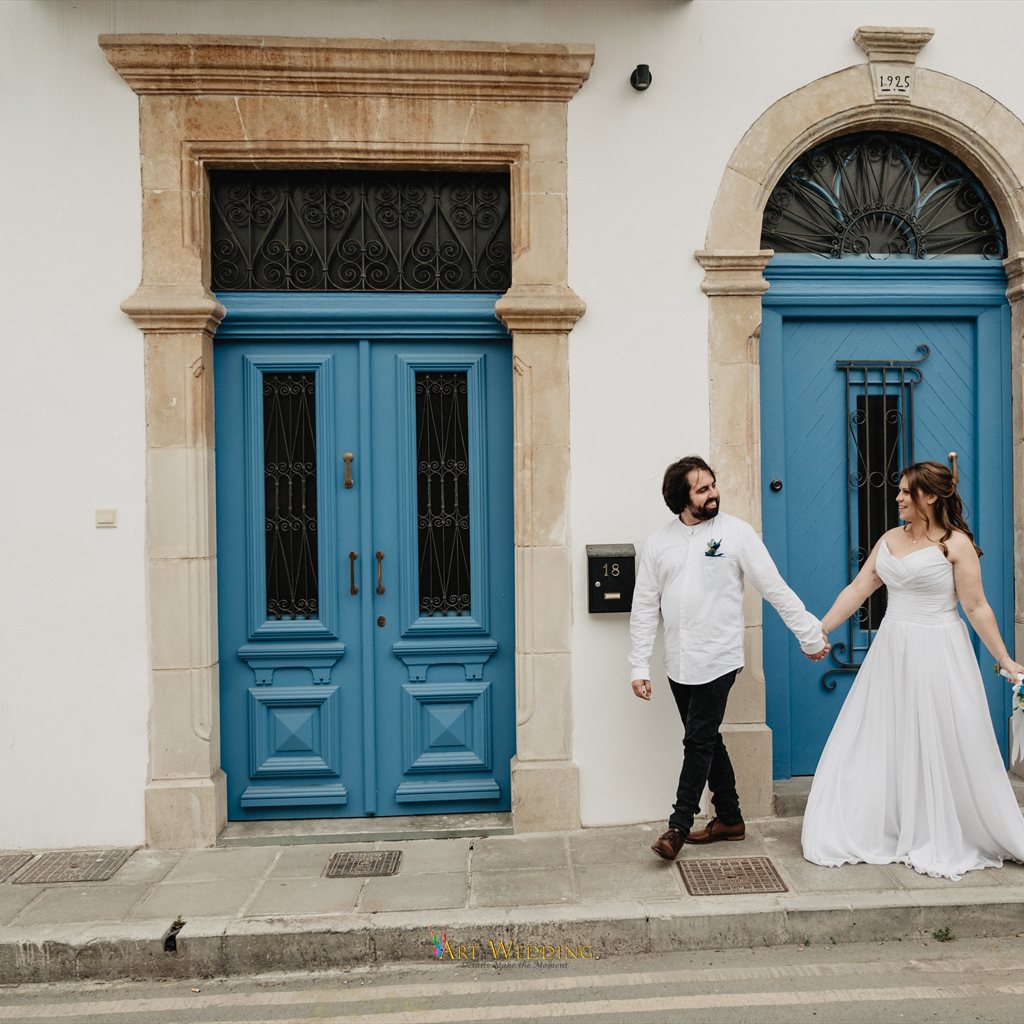Wedding walk beside blue doors in Larnaca