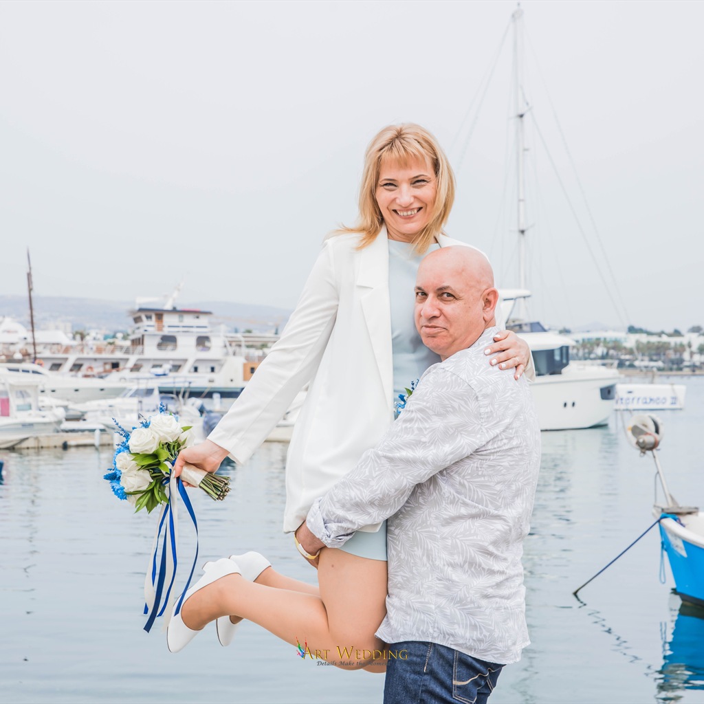 Newlyweds by the yachts in Paphos harbour