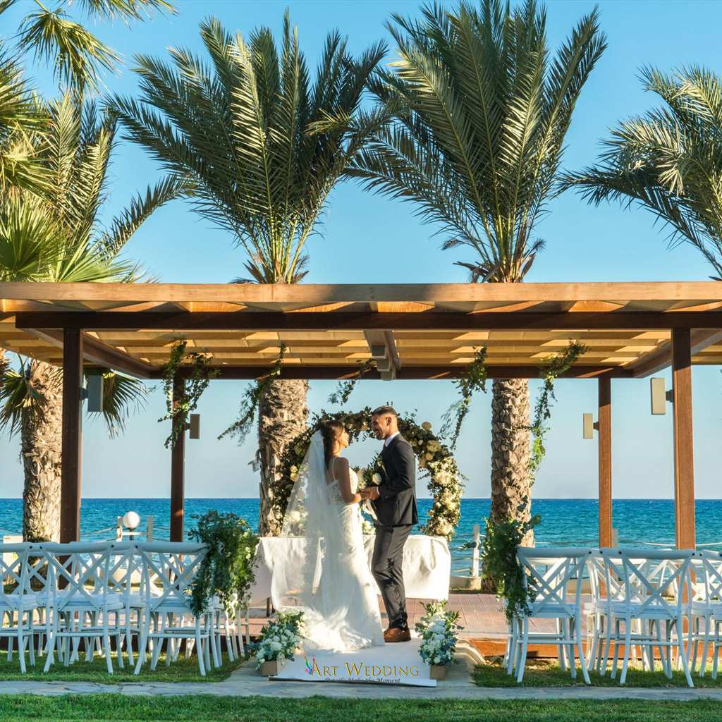 Seafront wedding ceremony at Golden Bay