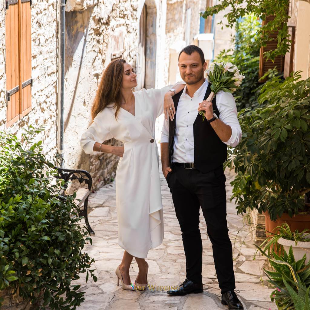 Wedding walk along a narrow stone lane — Lefkara, Cyprus