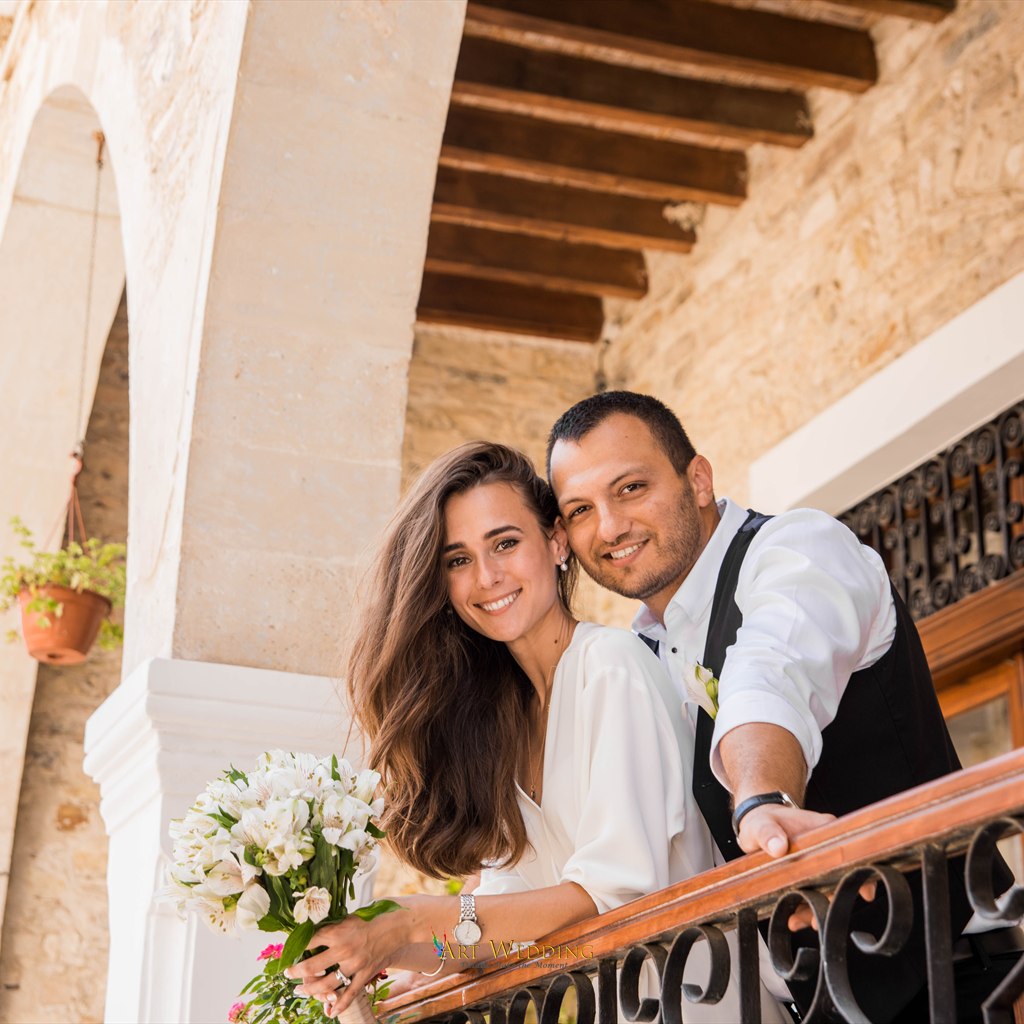 Wedding portrait on a stone balcony — Lefkara, Cyprus