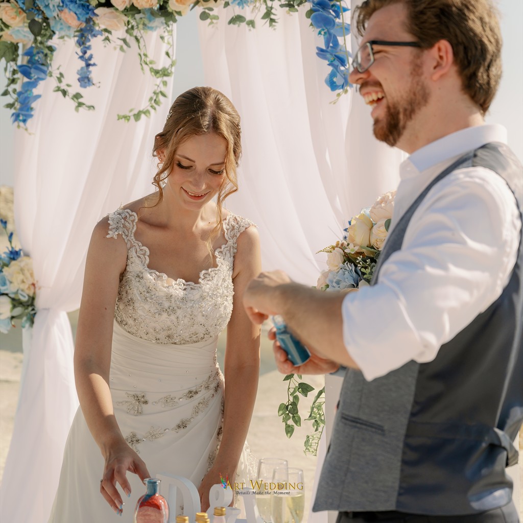 Newlyweds during their sand ceremony