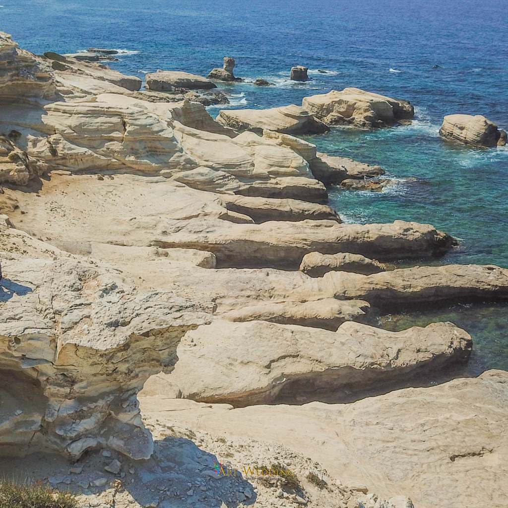 Aerial view of white cliffs and turquoise sea